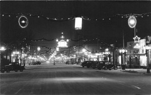 H82/ Colorado Springs Colorado RPPC Postcard c1940s Night Main Street 70