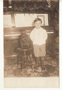 RPPC   BOY & DOG / HOFFMAN UPRIGHT PIANO 1909 postcard