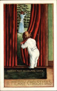 Christmas Child Watching Mother Decorate Tree c1910 Vintage Postcard