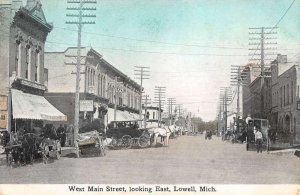 Lowell Michigan Main Street Looking East Vintage Postcard AA33983