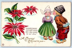 1915 Christmas Poinsettia Flowers Dutch Kids With Gift Embossed Antique Postcard