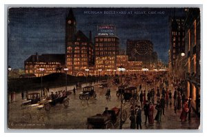 Postcard IL Michigan Boulevard At Night Chicago Illinois Old Cars Store Fronts