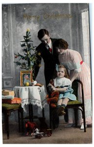 1910s Merry Christmas Teddy Bear Little Girl with her Parents Postcard