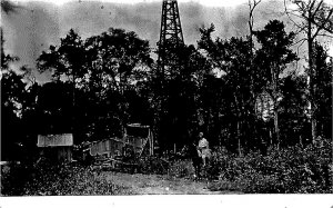 RPPC MEN ON HORSES AT OIL WELL REAL PHOTO POSTCARD (c. 1910)