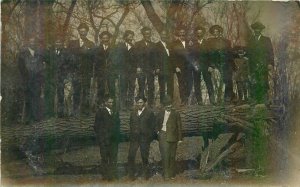 C-1910 Group Photo Men Log Well Dressed Suits hats RPPC Photo Postcard 20-1594