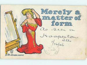 Pre-1907 risque signed PRETTY WOMAN CHECKS HERSELF OUT IN MIRROR HJ3049