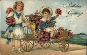 Birthday Little boy and Girl Gilt Embossed Carriage c1910 Vintage Postcard