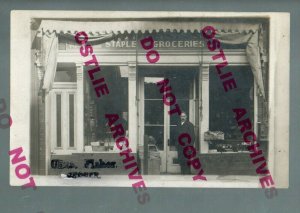 rppc c1910 ADVERTISING Grocery Store CHARLES FISHER GROCER Posing Cleveland?