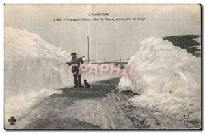 Old Postcard The Auvergne Winter landscape on the road on a snowy roof