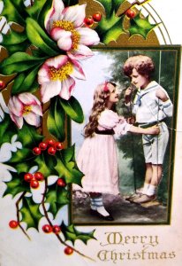 Christmas Postcard Children Outside On Swing Holly Flowers Vintage Embossed