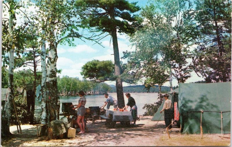 People camping & grilling at the Fish Creek Public Campsite, Adirondacks, NY