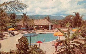 Port-au-Prince, Haiti  PAUL WEESNER'S RIVIERA HOTEL  Pool~Tiki Cabanas  Postcard