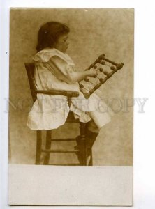 234163 Little Girl pupil w/ ABACUS Vintage PHOTO postcard