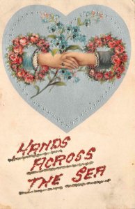 VALENTINE HEART HANDS ACROSS THE SEA SHIP GLITTER ADDED POSTCARD (c. 1910)