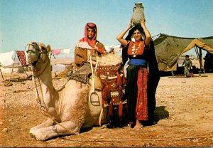 Israel Bedouins In Native Dress and Their Camel Near Their Tent