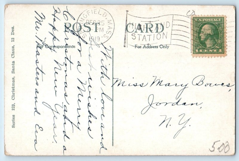 1919 Christmas Santa Claus Putting Toys On Stocking Springfield MA Postcard