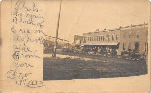 H99/ Erie Illinois RPPC Postcard c1910 Main Block Stores Wagons  29