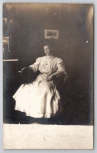 RPPC Woman Tiny Waist Seated For Photo Interior View Postcard P21