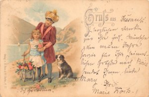 Germany 1899 Gruss aus Dessau Girl Mom Dog Roses Cart vintage postcard C312