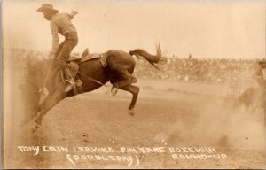 Real Photo PC Tony Cain Leaving Pin Ears Bozeman Montana Round-Up Bucking Bronco