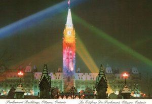 CONTINENTAL SIZE POSTCARD PARLIAMENT BUILDINGS AT OTTAWA CANADA WINTER LIGHTS