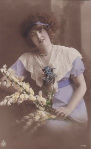 RP: Portrait of woman wearing Lilac gown holding bouquet of flowers, 1900-10s