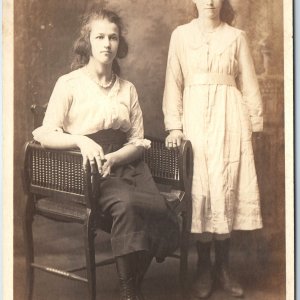 c1920s Sisters Studio Portrait RPPC Postcard Hair Bow Cane Chair Laced Boot Sash