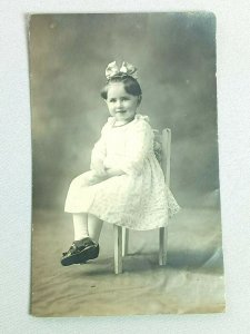 Vintage Postcard RPPC Young Girl Sitting on Chair in White Dress Portrait