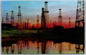 Vtg California CA Oil Wells At Sunset Derricks Reflection 1950s View Postcard