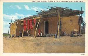 Chili (Red Pepper) drying in front of Adobe Home Misc, New Mexico NM