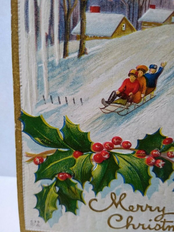 Christmas Postcard Gold Border Embossed Children On Sled Icicles Snow Nash c 35 