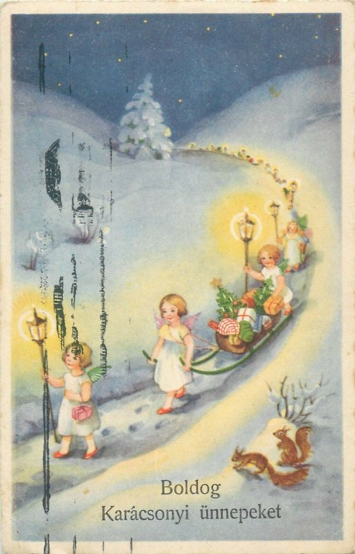 Winter fantasy Christmas greetings cherub angels gifts sledge lamp fantasy 1940s