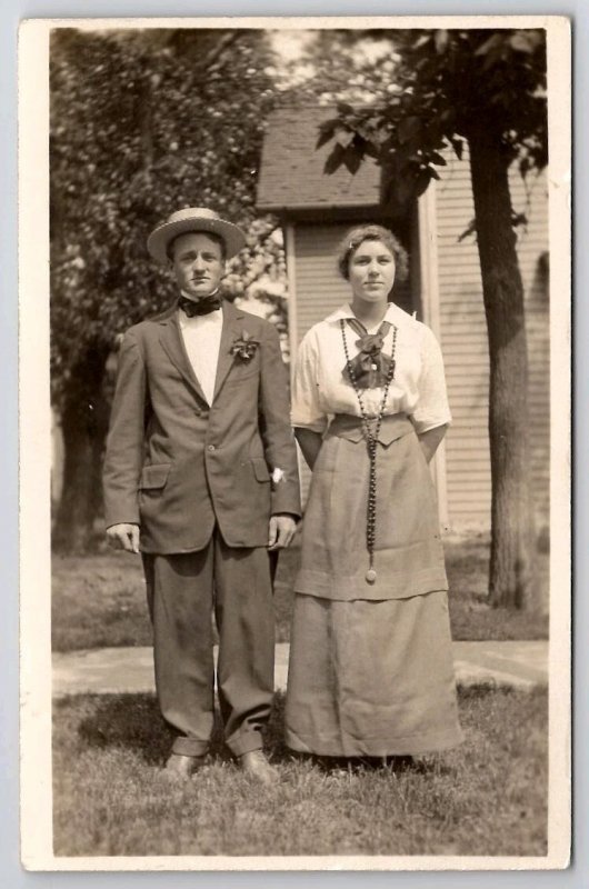 RPPC Lovely Young Lady Long Bead Necklace Watch Fob And Gentleman Postcard I38