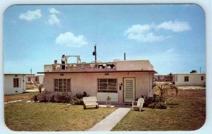 Advertising FLORIDA SUN DECK HOMES, Hialeah FL~Protected from Atom Bomb Postcard