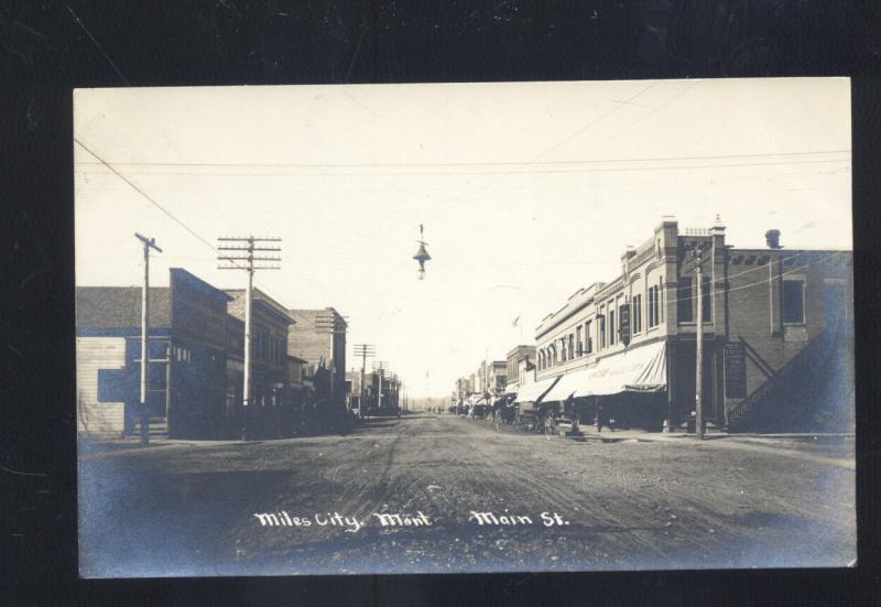 RPPC MILES CITY MONTANA DOWNTOWN MAIN STREET SCENE OLD REAL PHOTO POSTCARD