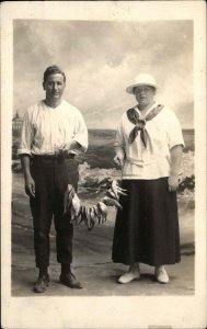 Cape Cod Studio Portrait Prop Fish Fishing Real Photo c1910 Vintage Postcard