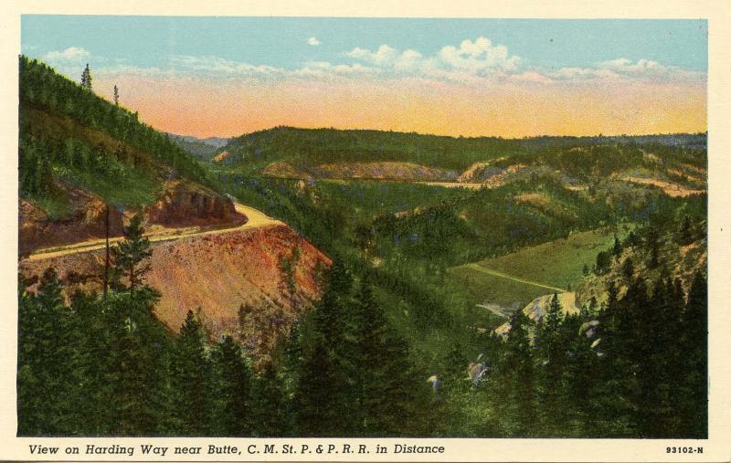 MT - Butte. Harding Way, C.M. St. P. & P. Railroad in Distance