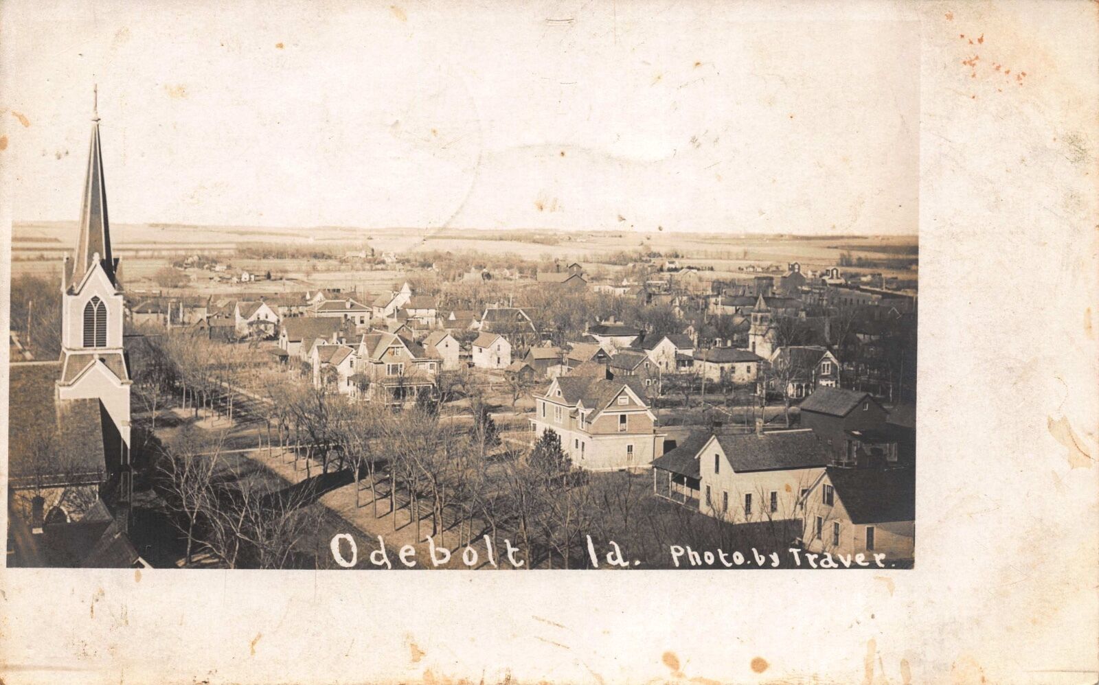 Real Photo Postcard Overview of Church & Homes in Odebolt, Iowa109701