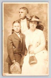 RPPC Dad Looks Away Mother & Son w/Hats AZO 1904-1918 ANTIQUE Postcard 1489