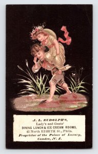 Rudolph's Palace of Luxury Restaurant, Boy carrying Girl Victorian Trade Card T1