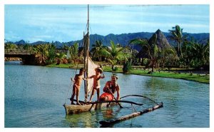 Tahitian Family in authentic canoe in Village Hawaii Postcard Posted 1969