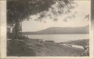 Logging - Log Boom in Maine Written on Back c1910 Real Photo Postcard