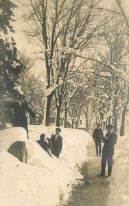 Postcard  c-1910 Men Winter Snowball Fight RPPC real photo 22-13954