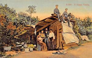 A HAPPY FAMILY~LARGE FAMILY IN SHANTY HOME~WILLIAM McMULLEN~POSTCARD 1909 PSMK