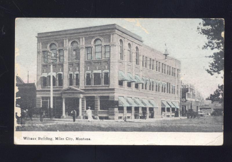 MILES CITY MONTANA DOWNTOWN STREET SCENE WIBAUX BUILDING VINTAGE POSTCARD