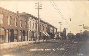 Parma MI Main Street Storefronts Trolley Horse & Wagon in 1908 RPPC Postcard