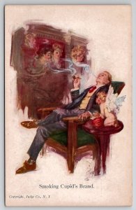 Man Smoking Cupids Brand Pretty Women In Smoke Postcard R29