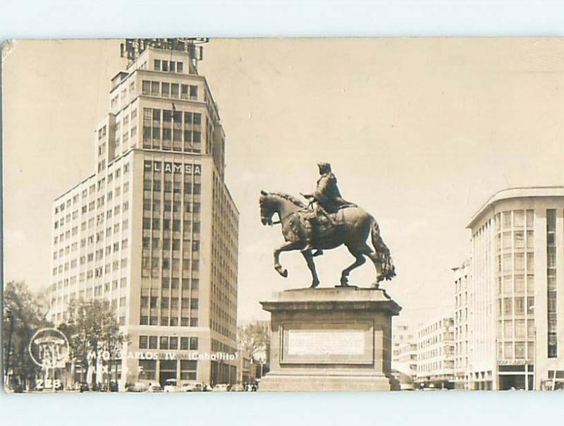 old rppc STATUE BY LAMSA BUILDING Mexico City Mexico HM2083