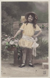 RP: Pretty Girl wearing Yellow Dress holding basket with Roses, 1910-20s