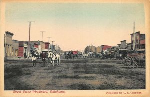 Woodward OK Dirt Street Scene Horse & Wagons Storefronts Postcard